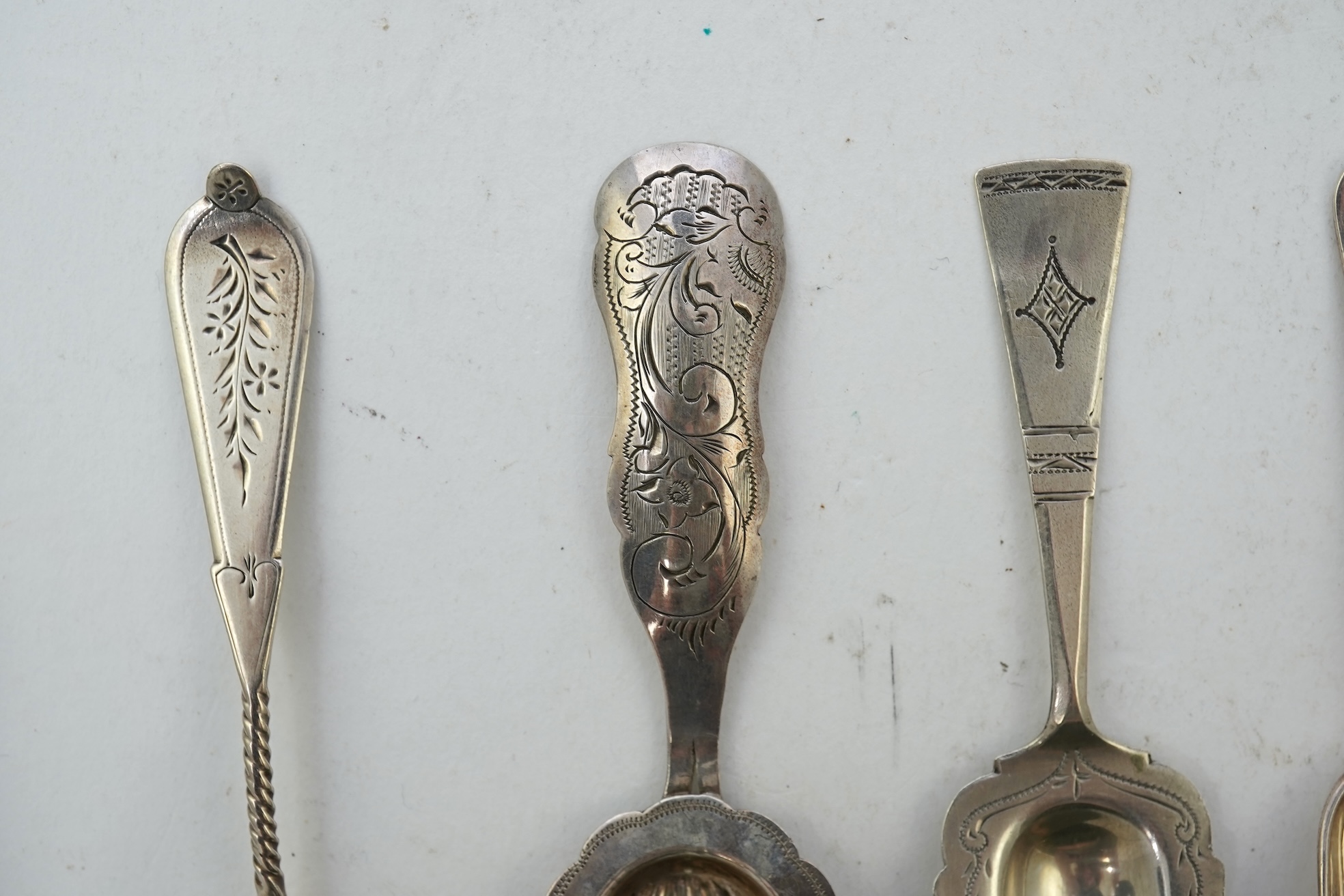 A collection of seventeen mainly 19th century Dutch white metal caddy spoons
